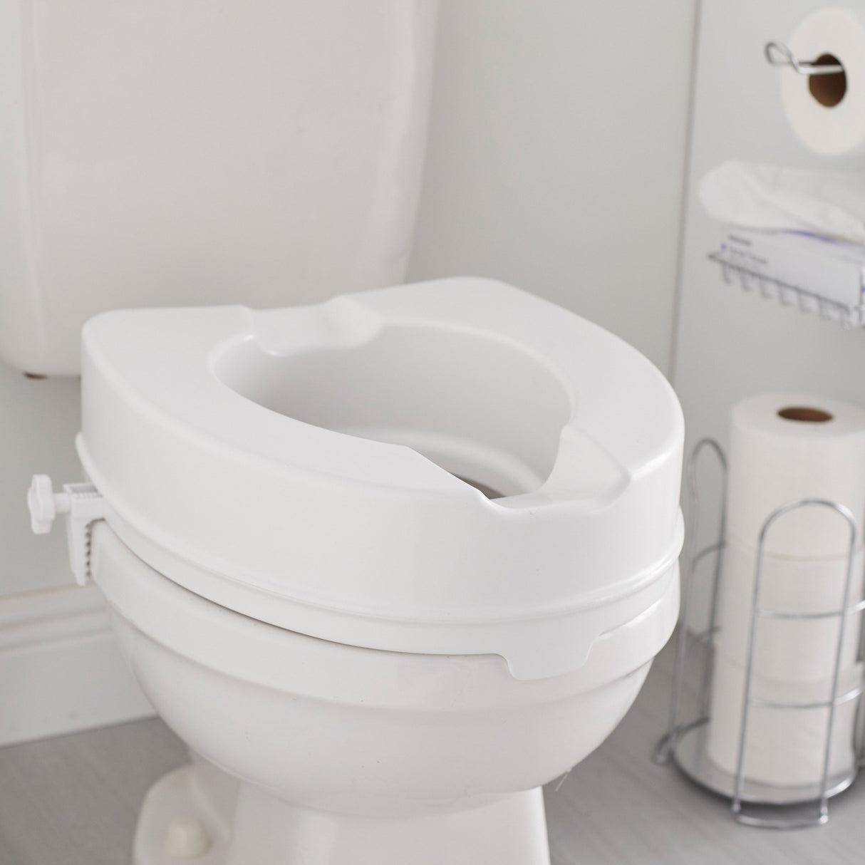 Raised Toilet Seat McKesson 4 Inch Height Standard / Elongated 400 lbs. Weight Capacity - BeHope