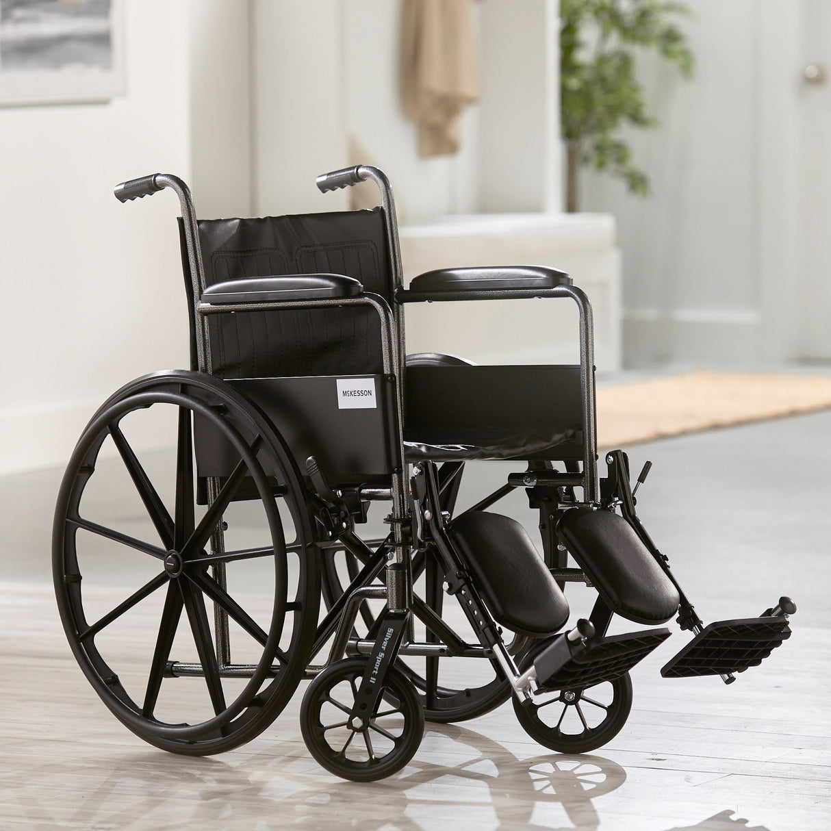 Wheelchair McKesson Dual Axle Full Length Arm Swing-Away Elevating Legrest Black Upholstery 18 Inch Seat Width Adult 300 lbs. Weight Capacity - BeHope