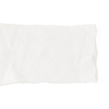 Close-up of Medline stretch tubular elastic dressing retention net material.