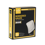 Medline Bordered Gauze Adhesive Island Wound Dressing, showing absorbency.